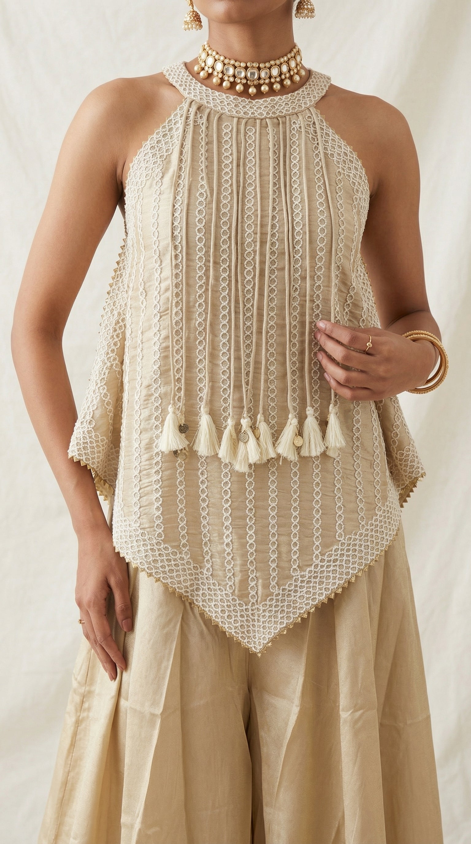 Beige Tissue Sharara Set with Halter Neck Peplum Top & Tassels | Mehendi & Festive Wear