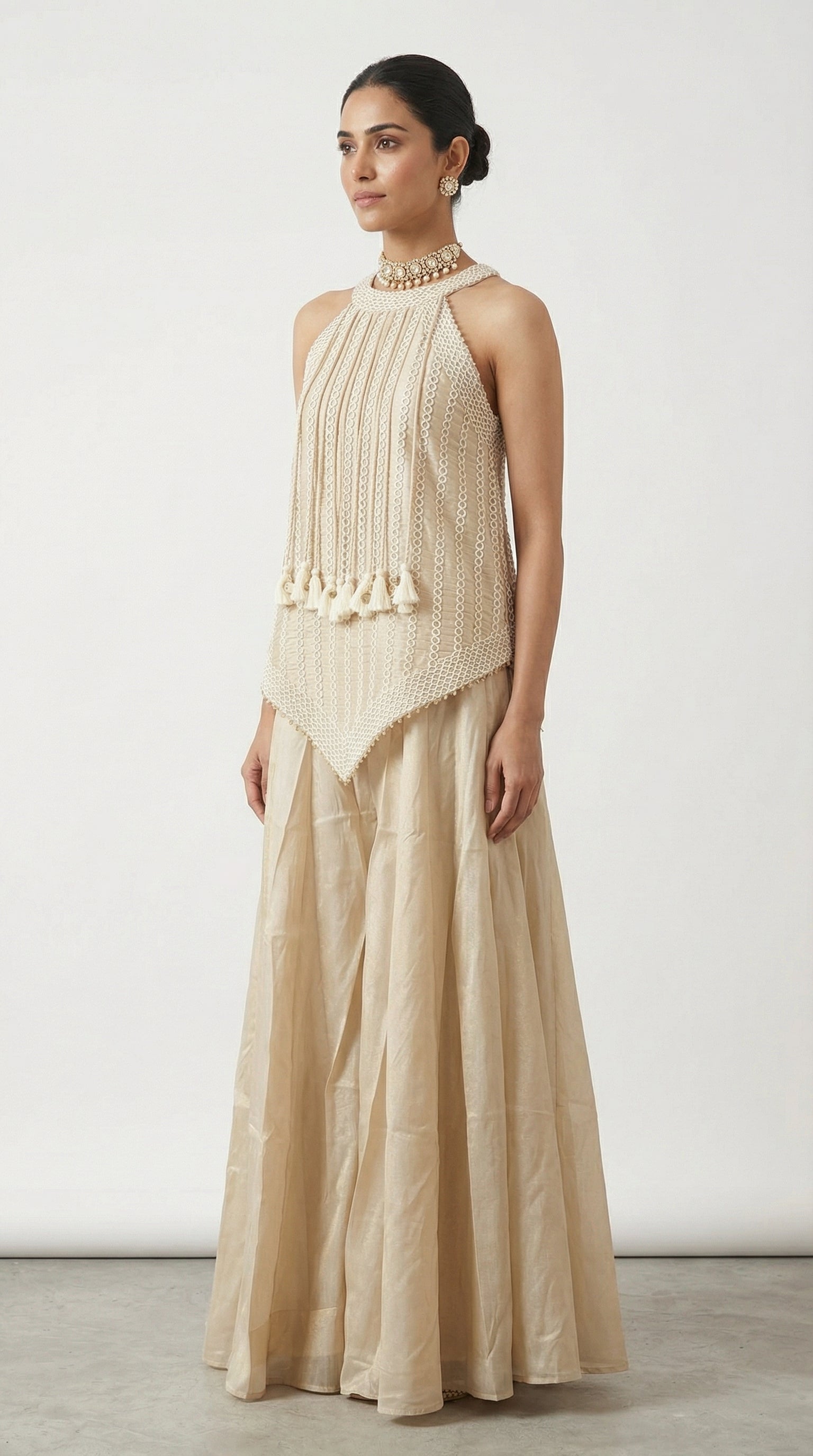 Beige Tissue Sharara Set with Halter Neck Peplum Top & Tassels | Mehendi & Festive Wear