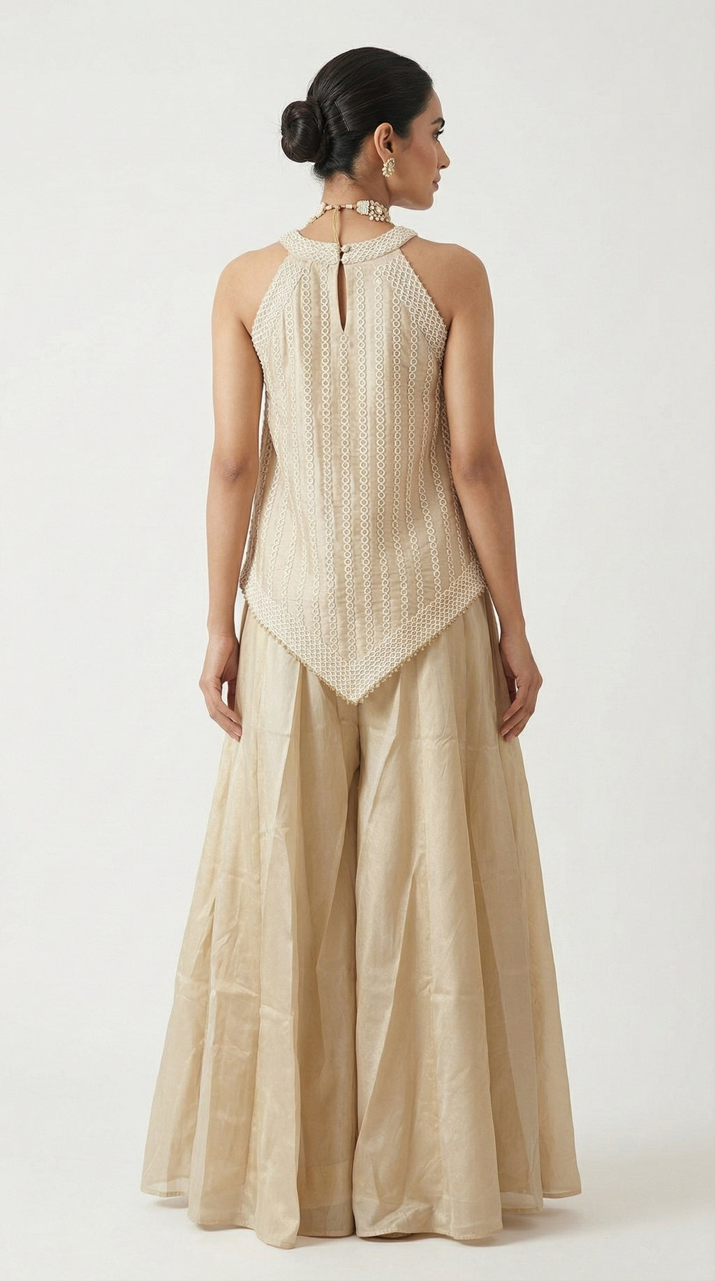 Beige Tissue Sharara Set with Halter Neck Peplum Top & Tassels | Mehendi & Festive Wear