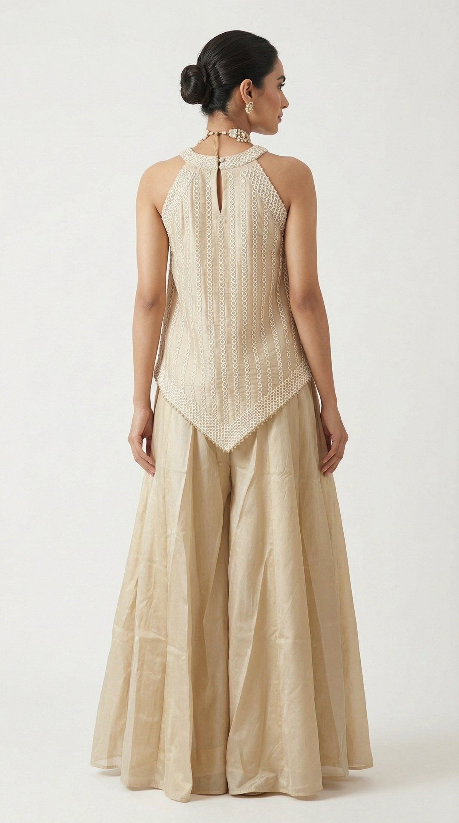 Beige Tissue Sharara Set with Halter Neck Peplum Top & Tassels | Mehendi & Festive Wear